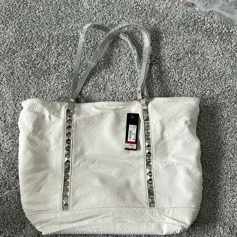 Brand new Marc Ecko white purse with tags.